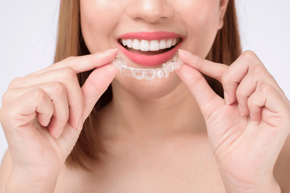 Can I get my teeth cleaned with Invisalign?
